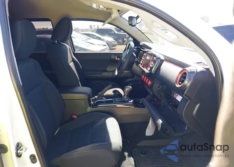 2023 Toyota Tacoma Trail Edition from USA, damaged, VIN 3TMCZ5AN9PM566482